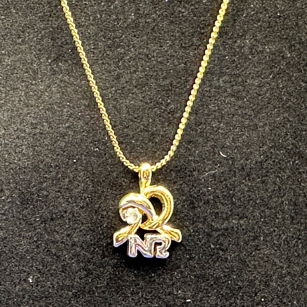 Nina Ricci gold and crystal necklace